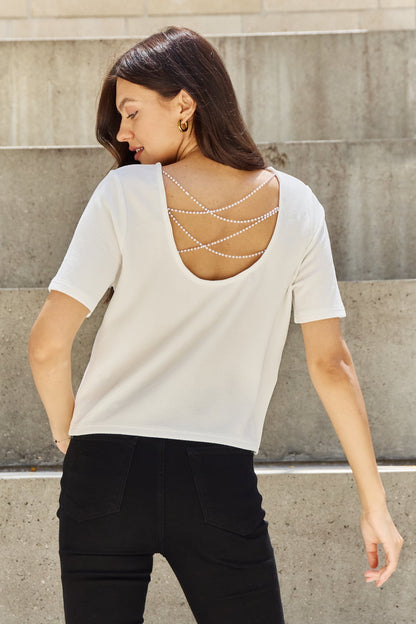 And The Why Pearly White Full Size Criss Cross Pearl Detail Open Back T-Shirt Dresses & Tops